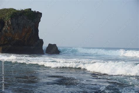 Mesra beach with a natural background. Mesra means intimate. Mesra beach also known as kukup ...