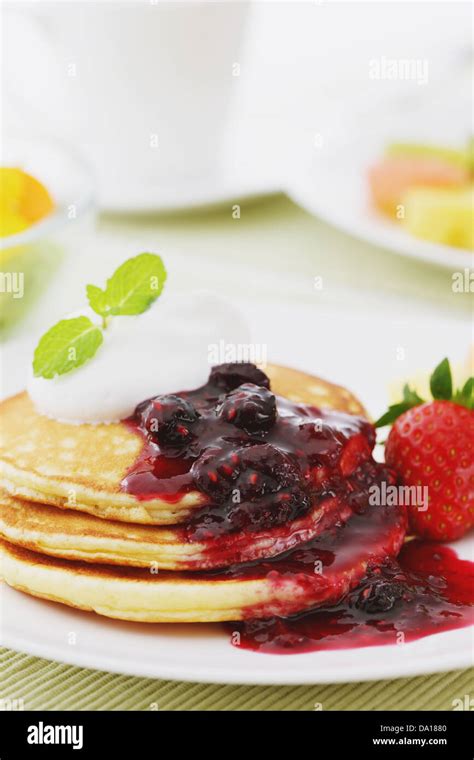 Pancakes and fruits Stock Photo - Alamy