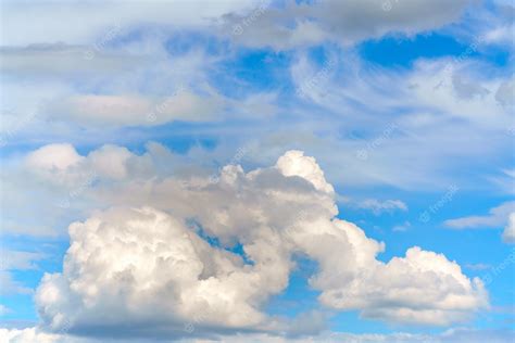 Premium Photo | Beautiful white clouds on a bright blue background