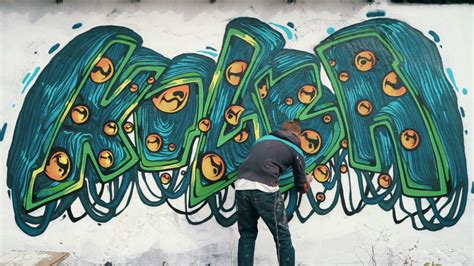 Graffiti artist drawing on the wall, timelapse Stock Video Footage ...