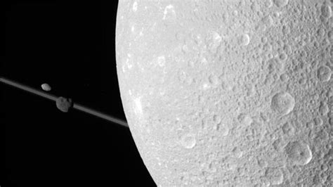 Nasa's Latest Pictures Of Saturn Moon Dione | World News | Sky News