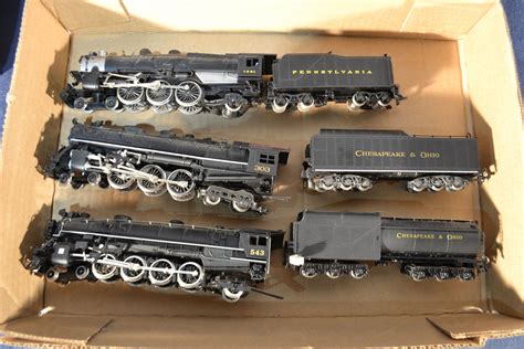 Three HO scale steam locomotives and tenders