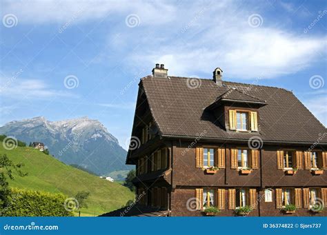 Swiss Wooden House In Alps Mountain Landscape Stock Photo - Image of ...