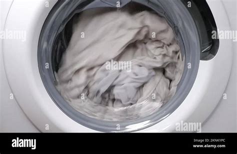 Washing clothes in a washing machine. Slow motion Stock Video Footage ...