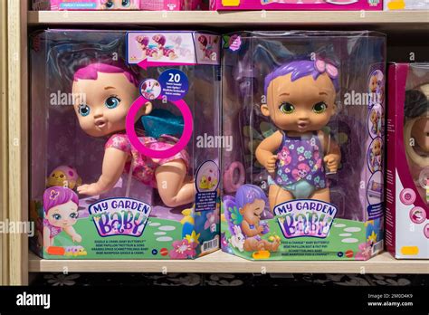 Baby dolls on the shelf of a toy store, manufactured by Mattel Inc ...