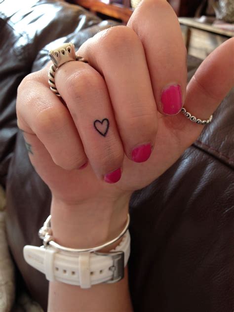 Heart finger tattoo. I like this placement. It won't distract from the ...