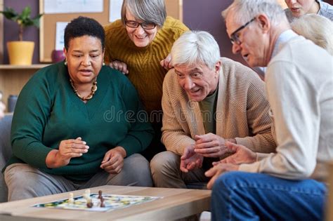 Senior People Playing Board Games Together Stock Image - Image of ...