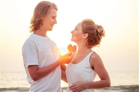 Silhouette of Romantic Lovers Hug with Sea Ocean with Sunset with Red ...