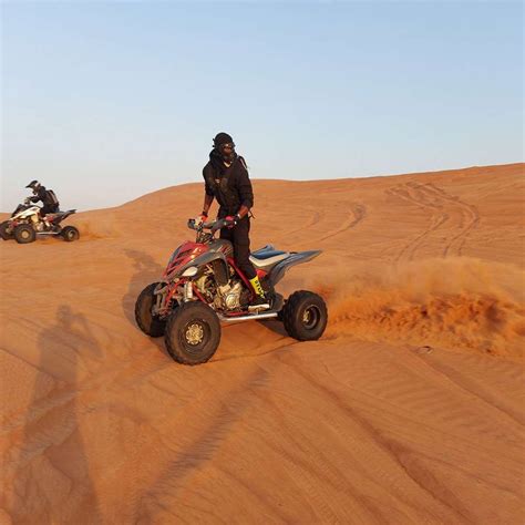 Desert Safari with Quad Bike BBQ Dinner - Seven Tours Dubai