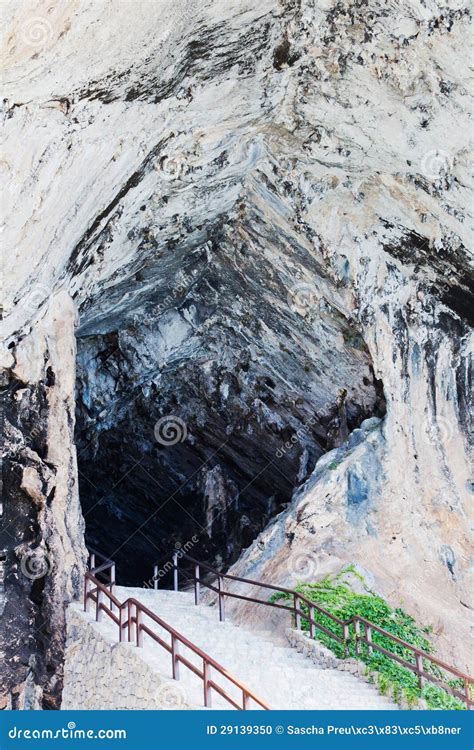 Dripstone cave entrance stock photo. Image of stairs - 29139350