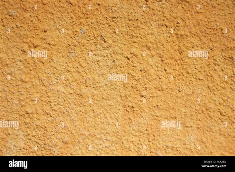 Yellow wall texture Stock Photo - Alamy