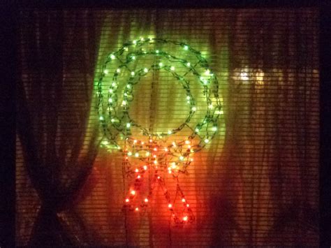 Christmas Wreath Lights in Window Picture | Free Photograph | Photos ...