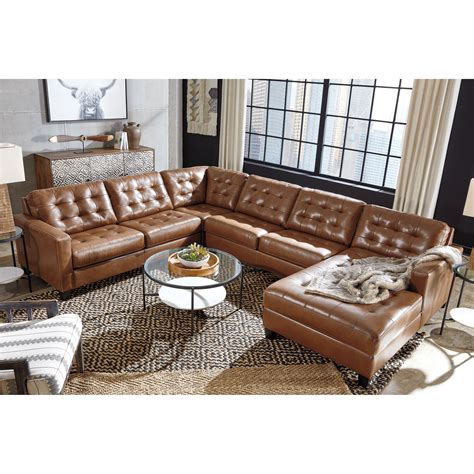 Signature Design by Ashley Baskove Leather Match 4-Piece Sectional with ...