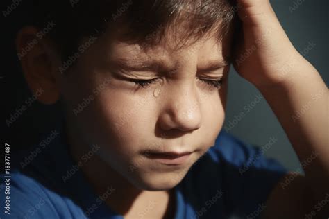 Little sad boy crying. Abuse of children concept Stock Photo | Adobe Stock