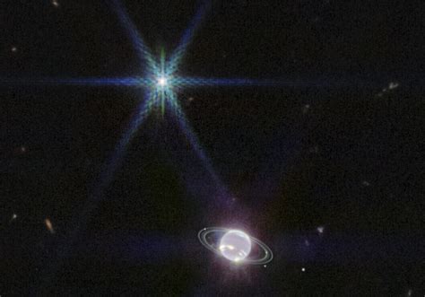 Images show rings of Neptune, solar system's outermost planet, with ...