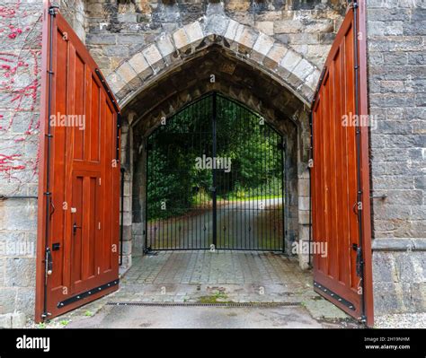 large wooden doors on a medieval castle gatehouse of Penrhyn Castle ...