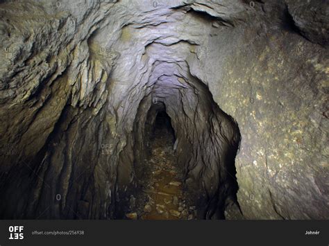 Tunnel in rock cave - Offset stock photo - OFFSET