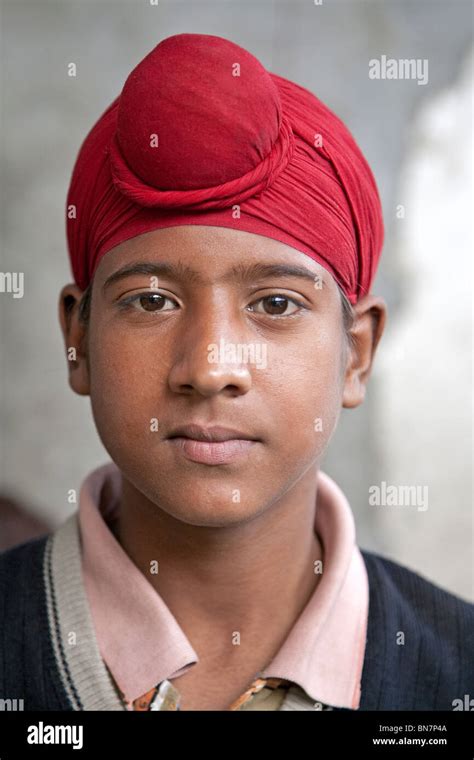 Sikh boy wearing the traditional patka (turban for boys). Amritsar ...