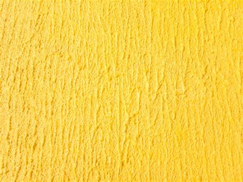 Premium Photo | Yellow wall texture.