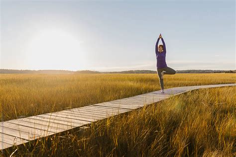 "Senior Citizen Yoga Outdoors" by Stocksy Contributor "Raymond Forbes ...