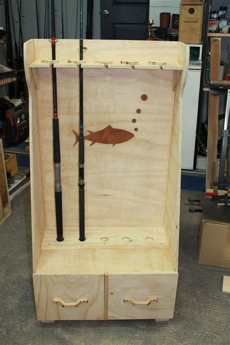 Fishing rod holder with drawers'' made by Pip'' | Fishing rod holder ...