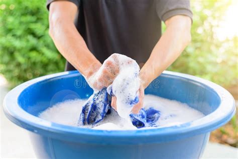 Washing Clothes by Hand in the Basin, White Clothes Mess Up Red Color ...