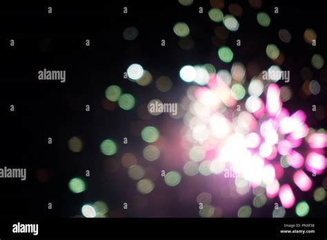 exploding fireworks in night sky Stock Photo - Alamy