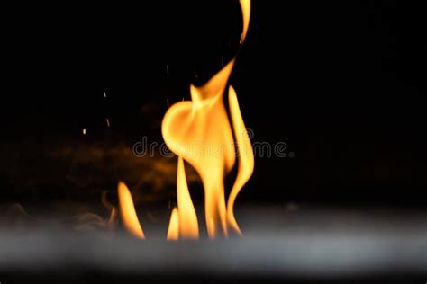 Flickering Flame stock photo. Image of black, fire, dark - 14731268