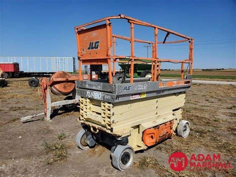 2009 JLG Scissor Lift - Adam Marshall Land & Auction, LLC