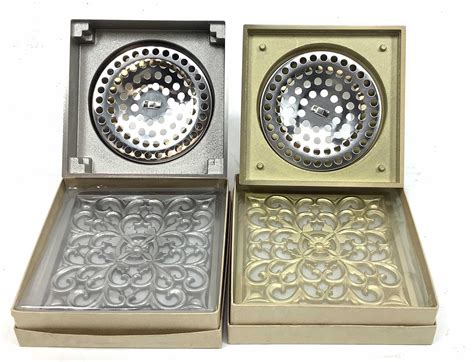 Lot - (24pc) Decorative Square Grate Shower Drains