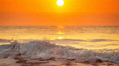 Ocean Waves In Orange Yellow Sky Background During Sunrise 4K HD Ocean ...