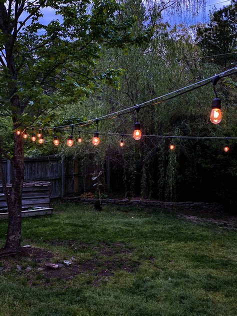 Outdoor String Lights across a backyard - Place Of My Taste