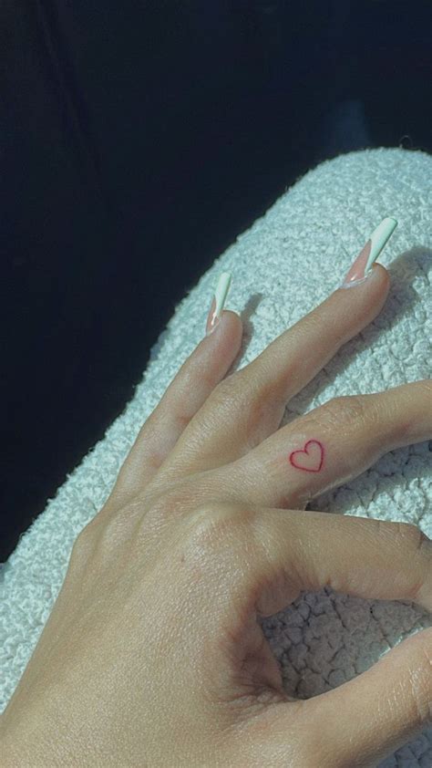 Heart finger tattoo | Red heart tattoos, Heart tattoo on finger, Heart ...