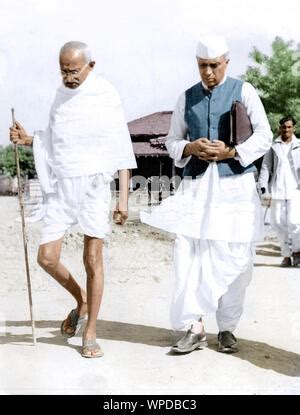 Mahatma Gandhi with Jawaharlal Nehru, three-quarter length portraits ...