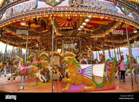 child on a funfair carousel at hyde park winter wonderland,london ...