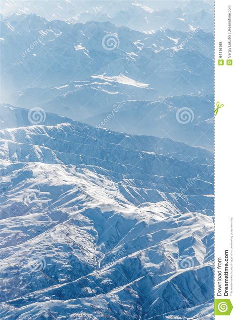 Aerial view of Himalayas stock image. Image of range - 64116169