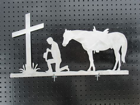 Kneeling at the cross – Junk Punks Art & Design