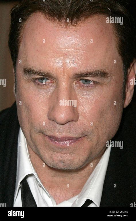 John Travolta seen with a visible mesh hairline while leaving Le ...