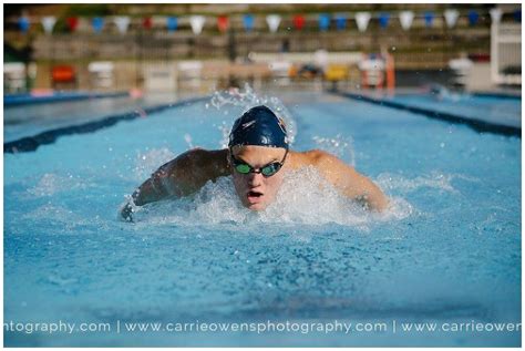 high school senior swimmer at the pool by utah photographer Carrie ...