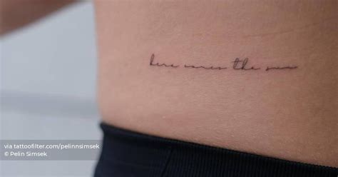 Tattoo that says "here comes the sun" handwritten on