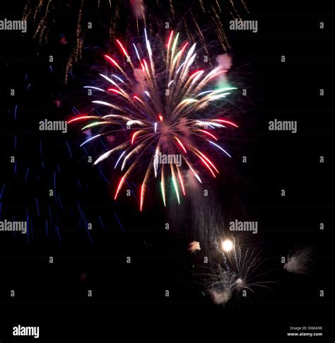 Fireworks exploding in night sky Stock Photo - Alamy