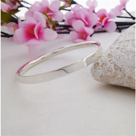 Engravable Solid Sterling Silver Bangle with a Unique Design.