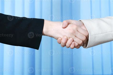 Business woman handshake 11582709 Stock Photo at Vecteezy