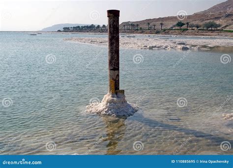 Measuring the Water Level of the Dead Sea Stock Image - Image of coast ...