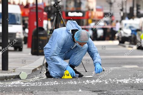 Forensic Police Officer Gathers Evidence That Editorial Stock Photo ...