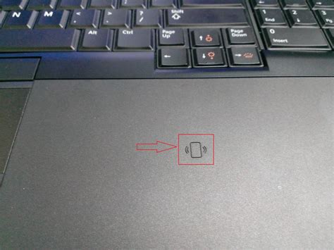 laptop - What does the "rectangle with waves" logo to the right of the ...