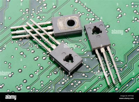 Closeup detail of transistors on circuit board Stock Photo - Alamy