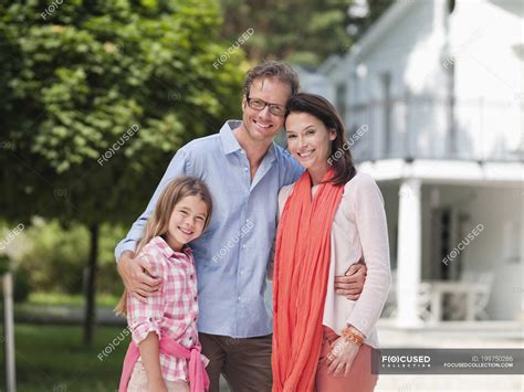 Family smiling together outdoors — girl, confidence - Stock Photo ...