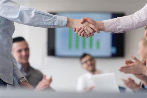 business womans handshake 12414862 Stock Photo at Vecteezy