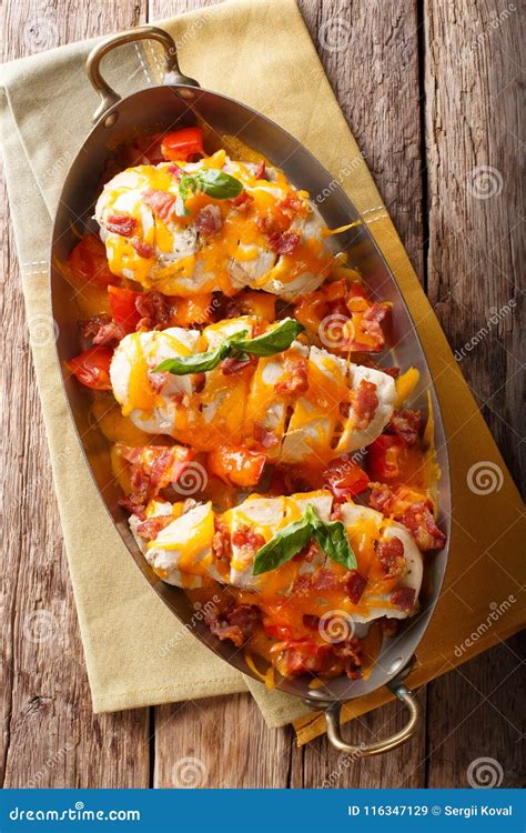 Spicy Chicken Fillet Baked with Bacon, Tomatoes and Cheddar Cheese ...